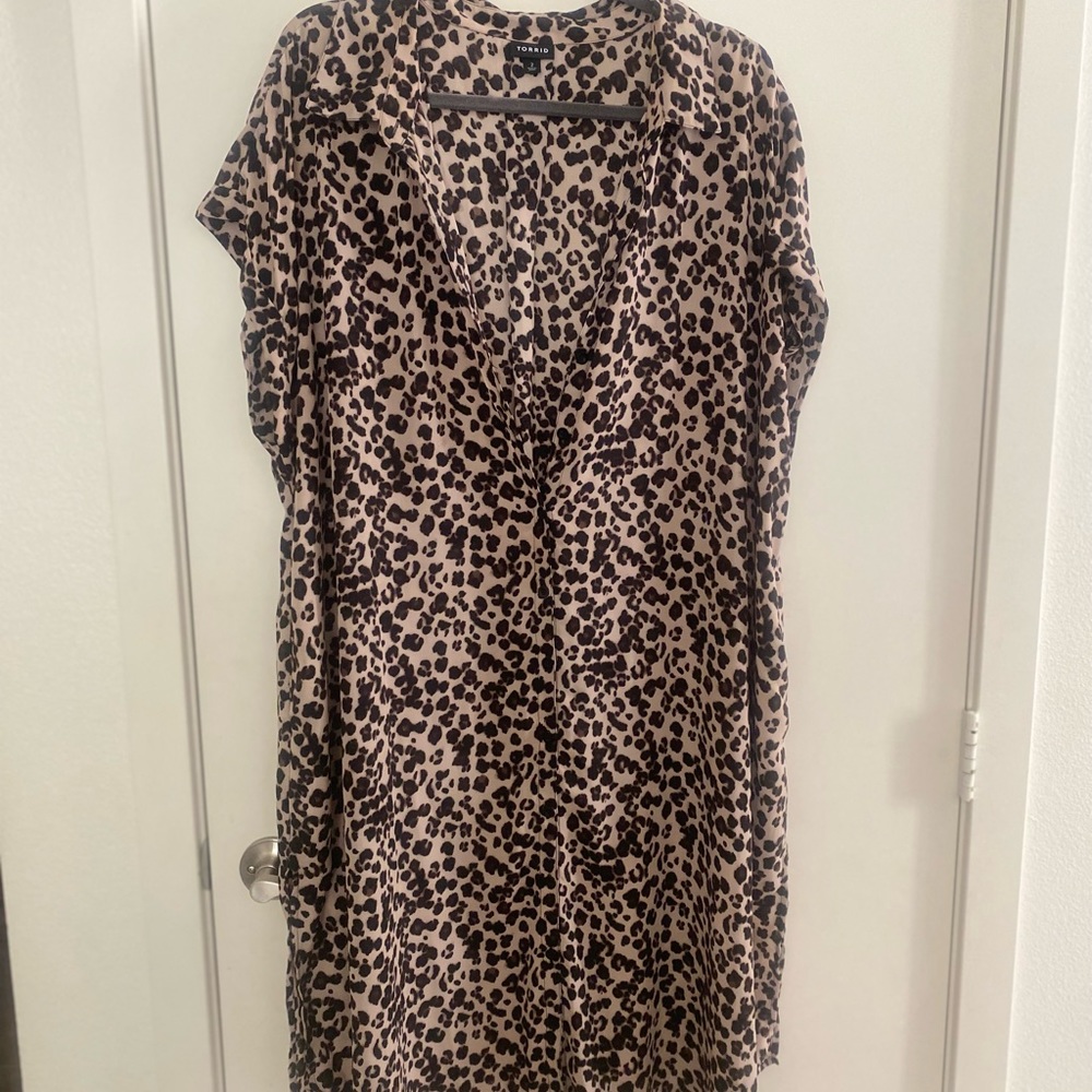Torrid short sleeve long button down.